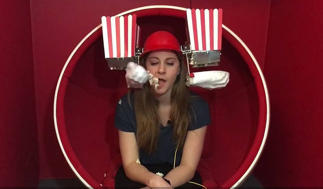 Simone Giertz Joins “Tested,” Builds Popcorn Feeding Helmet